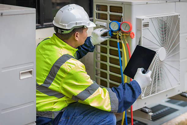 Professional Hvac technician working in Rogers, TX